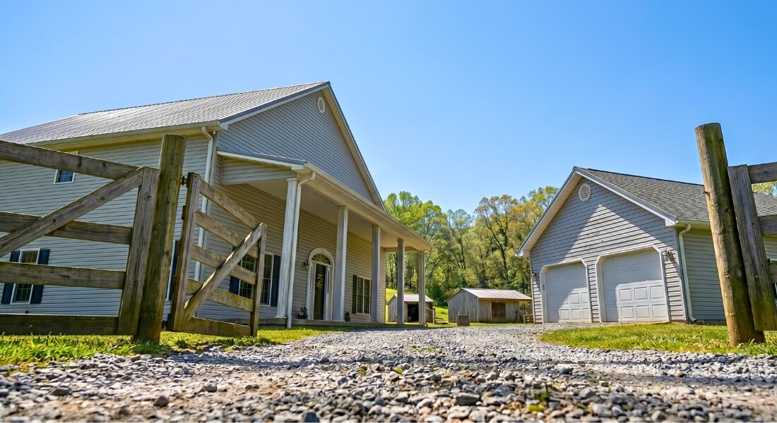 Rural New River Valley home with acreage and gravel road access.